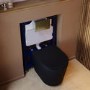 Matt Black Wall Hung Rimless Toilet with Soft Close Seat, Brushed Brass Pneumatic Flush Plate, 820mm Frame & Cistern – Verona